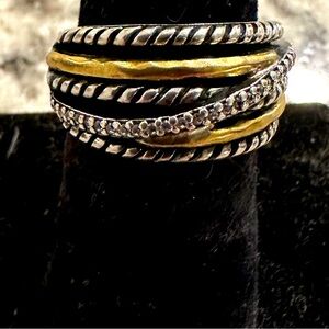 Beautiful brass and .926 SS ring. There are also CZ in it as well’